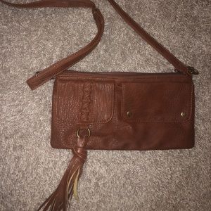 Volcom cross-body purse.